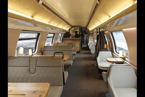 The upper level of SBB's Starbucks coach has a lounge area.